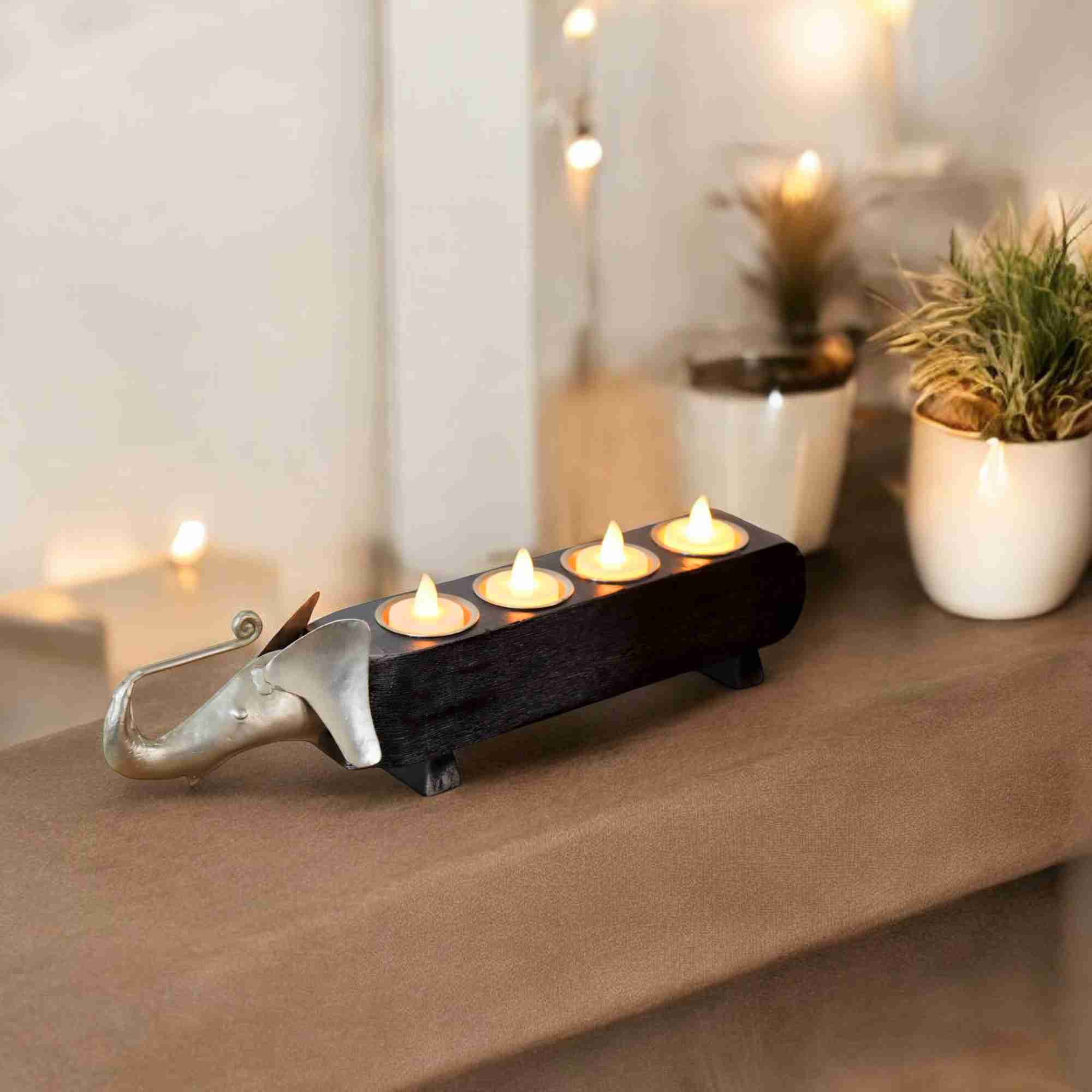 Eleganza: 4-Light Candle Delight with Elephant