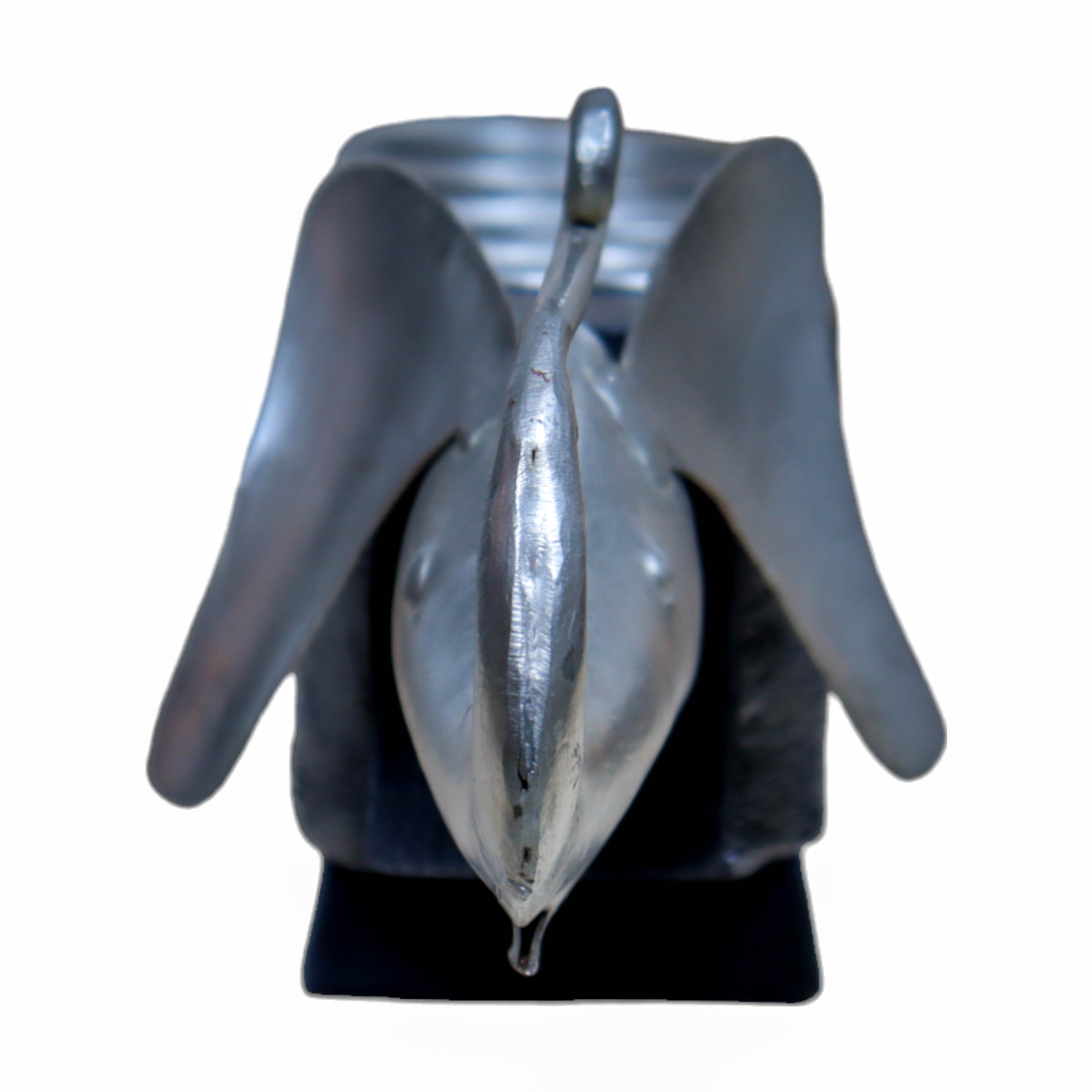 Eleganza: 4-Light Candle Delight with Elephant