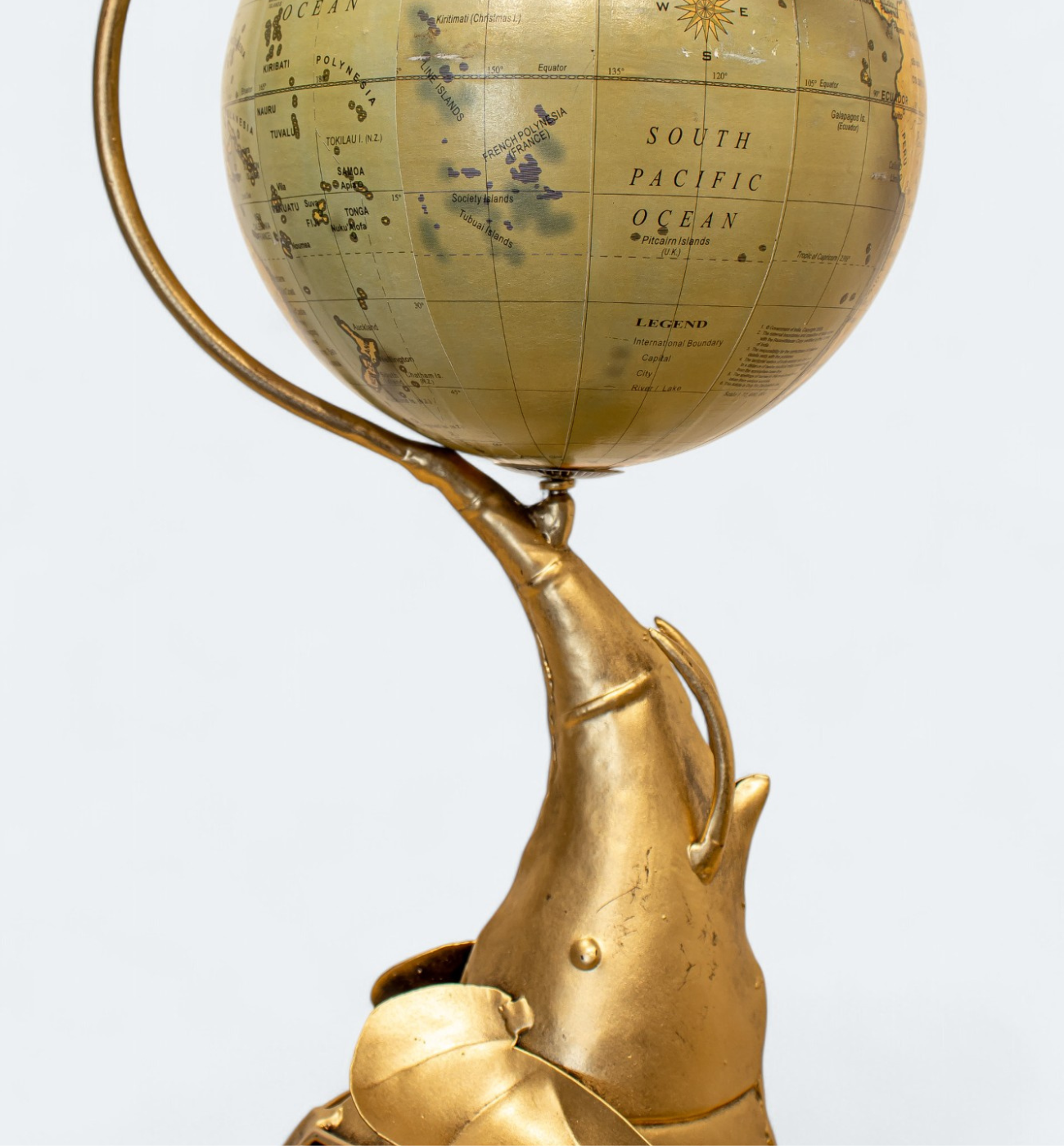 Unique Globe-Holding Elephant Figurine