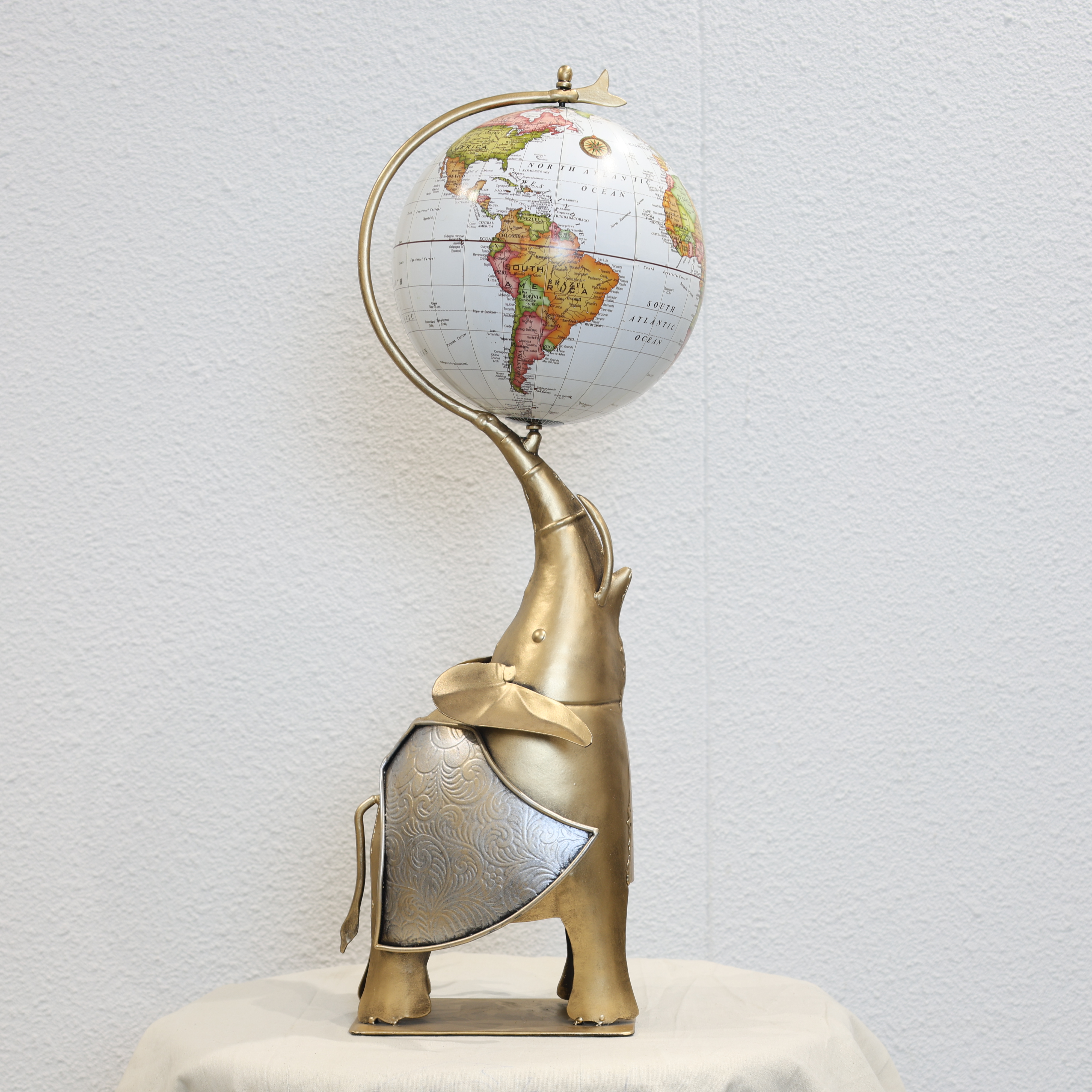 Globe Holding Elephant Showpiece