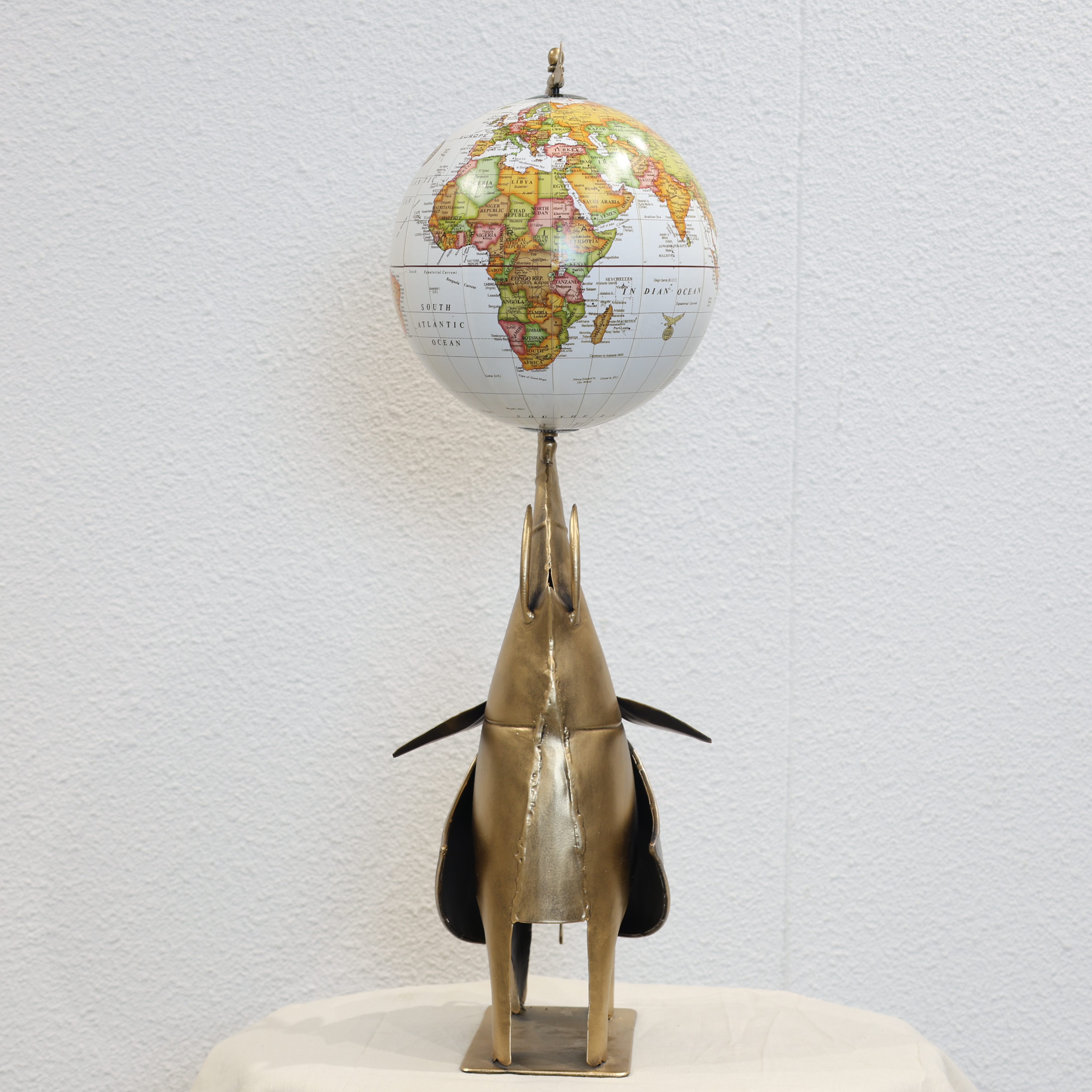 Globe Holding Elephant Showpiece