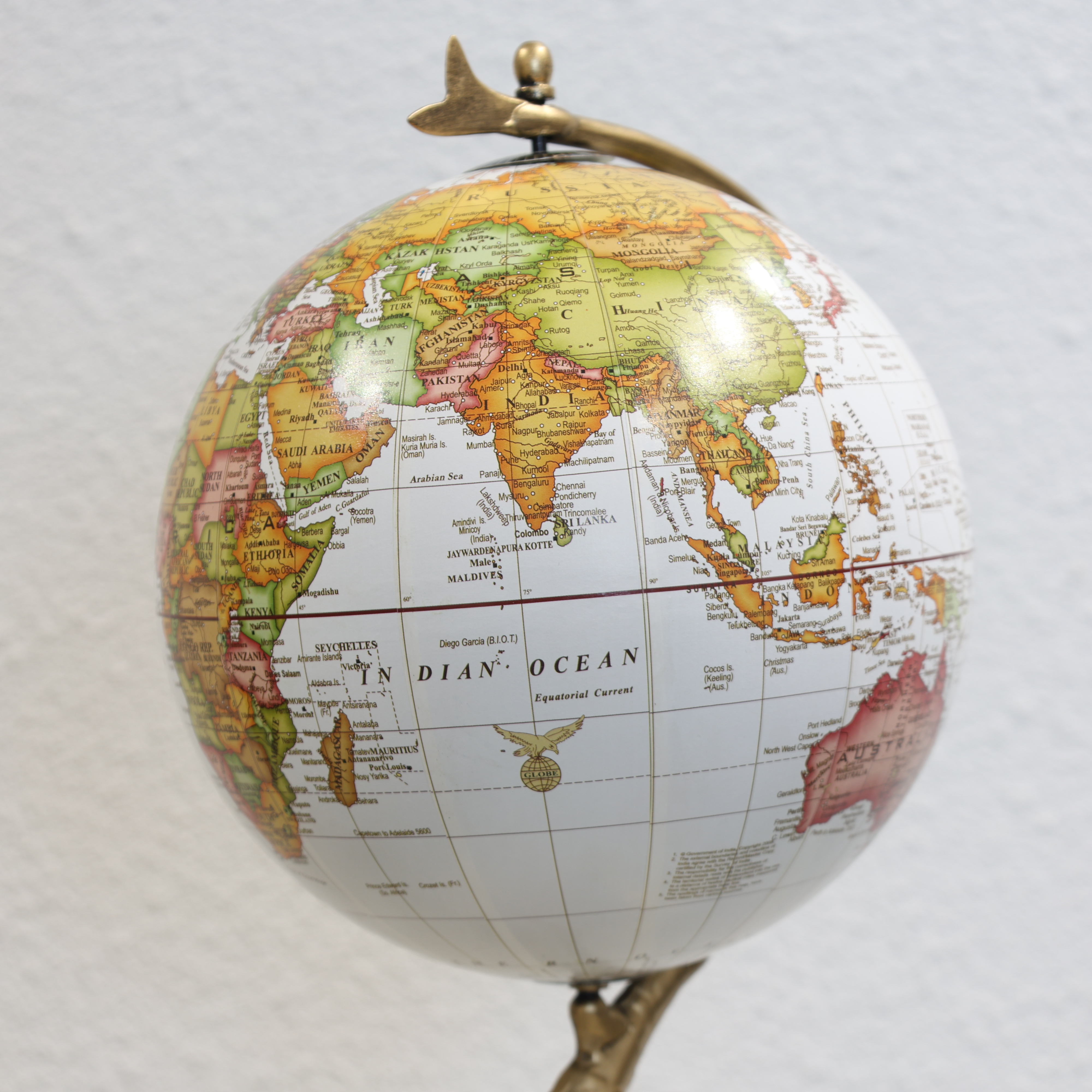 Globe Holding Elephant Showpiece