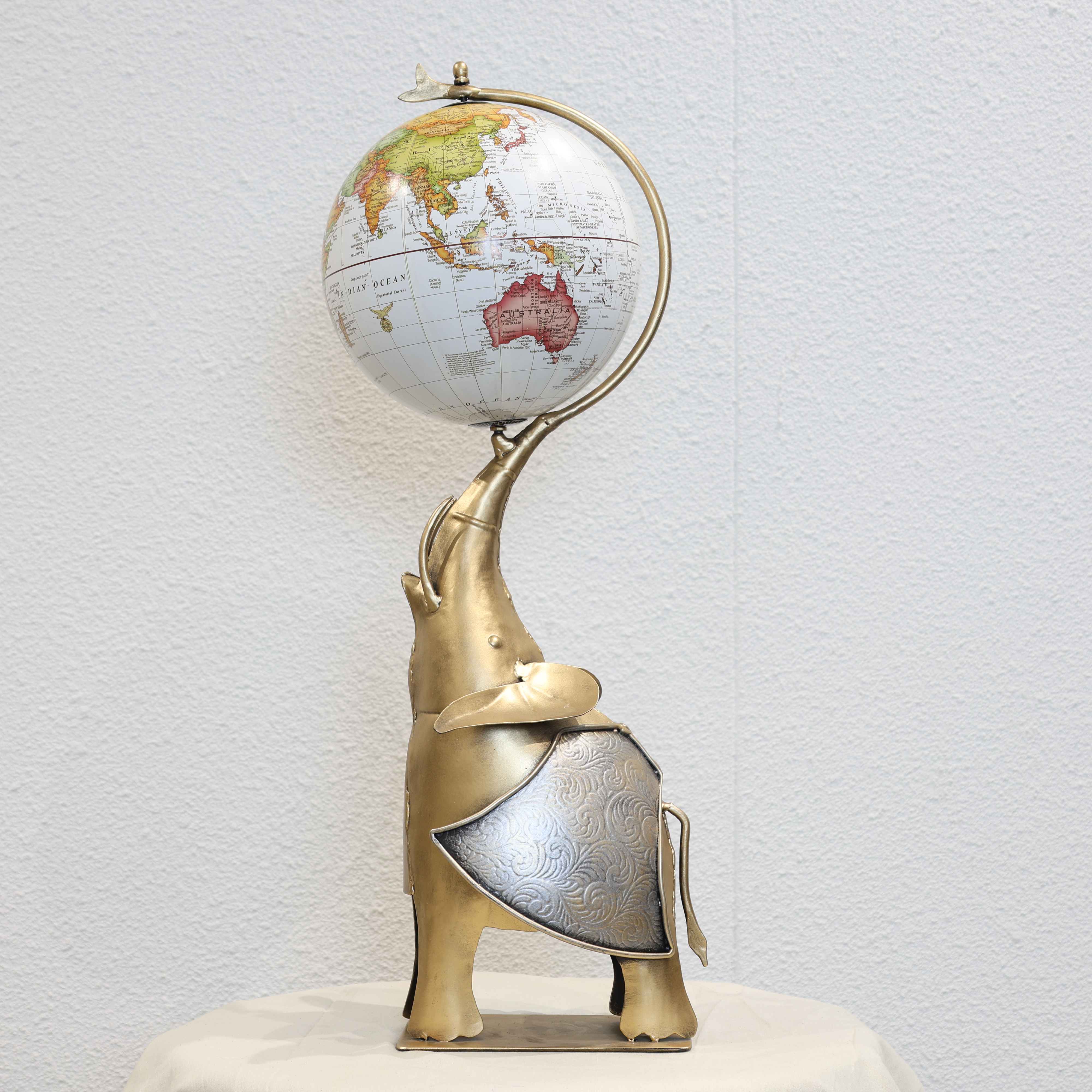 Globe Holding Elephant Showpiece